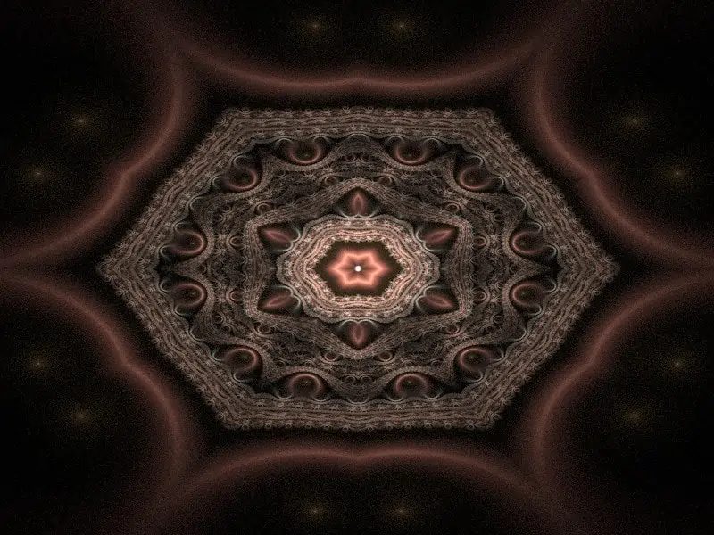 Hexagonal pattern with intricate, swirling designs in shades of pink and brown, creating a glowing, symmetrical mandala effect.