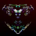 Colorful floral patterns form a heart shape on a dark background, each side mirroring the other, with green, blue, and purple hues.