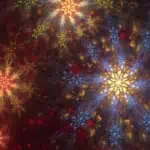 Colorful starburst patterns with blue, yellow, and red hues create a vibrant, festive display against a dark background.