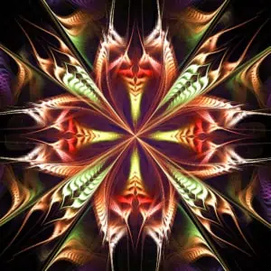 Colorful symmetrical pattern with bright reds, greens, and purples, resembling a starburst or floral design, on a dark background.
